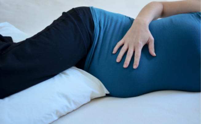 Right Between the Knees: Benefits of Sleeping With a Pillow